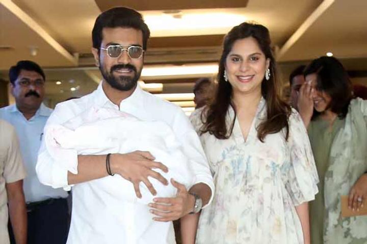 ram charan seen with new born baby