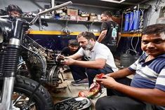 Rahul Gandhi seen repairing bike at mechanic shop photo viral