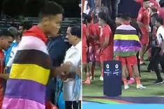 manipuri footballer carrying meitei flag at medal ceremony