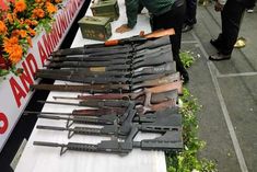 1182 cadres of eight tribal organizations lay down arms in assam