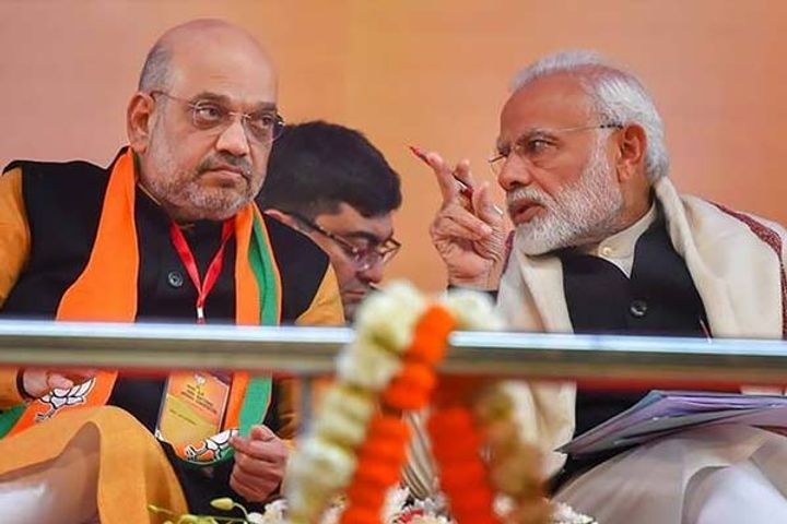 pm modi spoke to shah over phone from france to know about flood situation