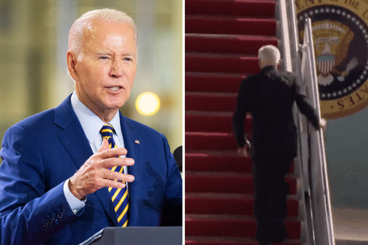 president joe biden stumbles again while going on the plane