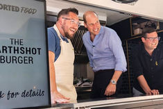 prince william of the royal family was seen serving burgers in london