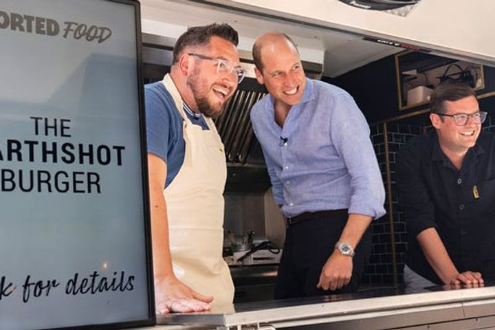 prince william of the royal family was seen serving burgers in london