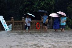 heavy rains wreak havoc in china 11 killed 27 missing